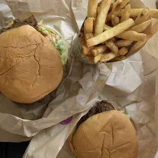 Spicy chicken sandwich (one white, one dark) and fries