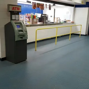 A real snack bar with snack bar fare: hot dogs, nachos, donuts, coffee.