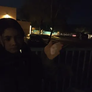 She's got the whole moon in her hand. Reflection of moon out of telescope. That's how bright it was!