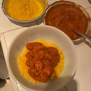 three bowls of chili and rice