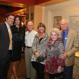 a group of people posing for a picture