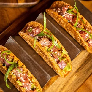Poke Tuna Tacos:
Flour tortilla, poke tuna, cream avocado.