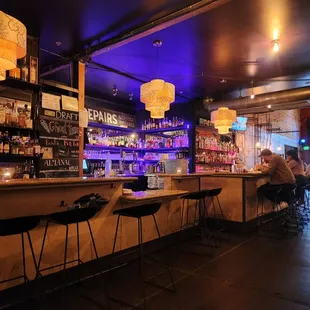 a man sitting at a bar