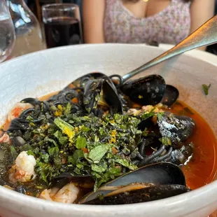 a bowl of mussels and shrimp