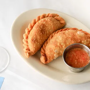 la empanada! knife-cut prime beef served with llajua sauce