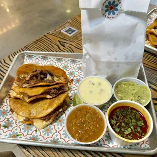 Quesabirria tacos and chips trío