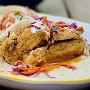 Best fish tacos. Redfish cornmeal crusted. Get it. :)...