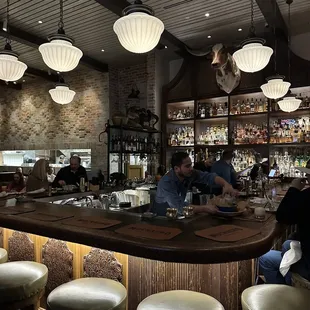 people sitting at the bar