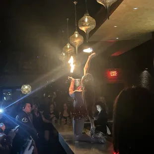 a woman on a stage performing