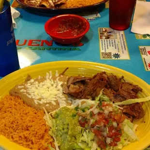 Closest is the fried pork carnitas (good)  Further is chicken something but can't remember the name