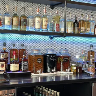 Back of bar with house made sangrias, jalapeño infused tequila