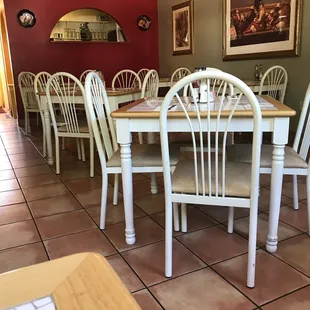 a table and chairs in a restaurant