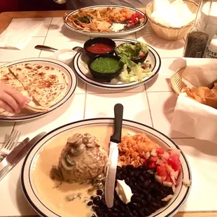 The bomb, chicken carnitas, guacamole with salsa, and kids quesadillas!