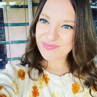 Emily L.