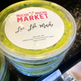a green smoothie in a plastic container