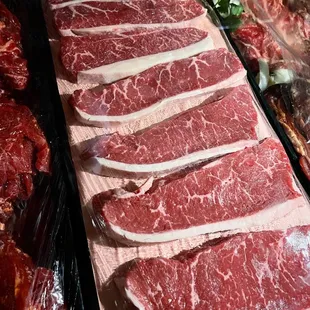 a variety of raw meat