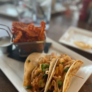 Piggy Tacos with sweet potato waffle fries