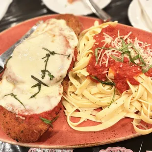 a plate of spaghetti and meat