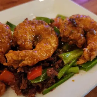 Devil with a shotgun -- the Applewood smoked bacon shrimp.