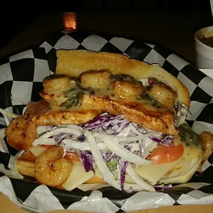 Cajun dusted Mako shark served over lemon pepper slaw and topped with a shrimp Florentine sauce