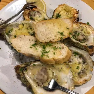 Char grilled oysters topped with parmesan. It was ok.