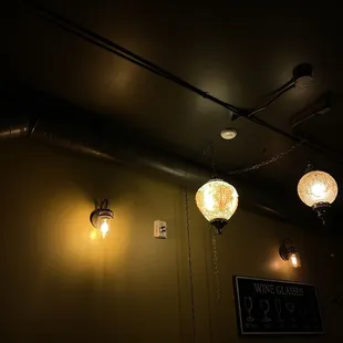 three lights on a ceiling