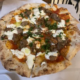 Sausage and herb pizza