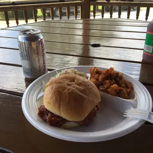 Lunch special: pulled pork sandwich with coleslaw and muddy creek potatoes.