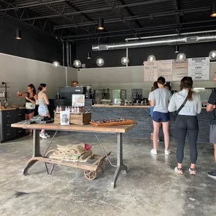 people standing in a coffee shop