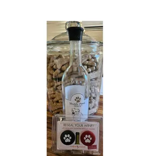 a bottle of wine and a bottle of dog treats