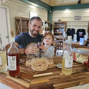 a man and a baby at the bar