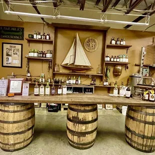 a bar with wine barrels