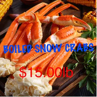 crab legs and corn on a cutting board