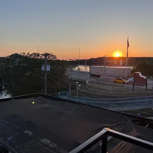sunset over a parking lot