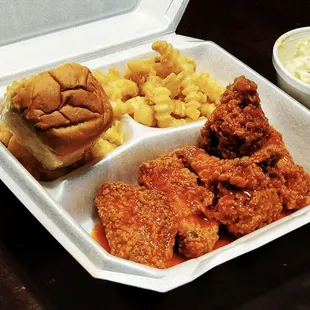 a meal in a styrofoam container