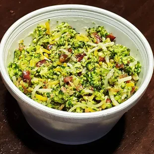 a bowl of broccoli salad