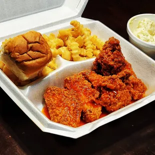 a meal in a styrofoam container