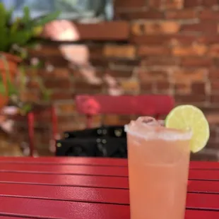 a drink on a red table