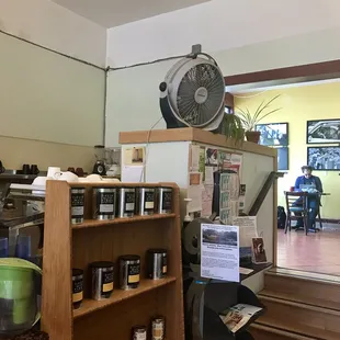 Various merchandise and additional seating.