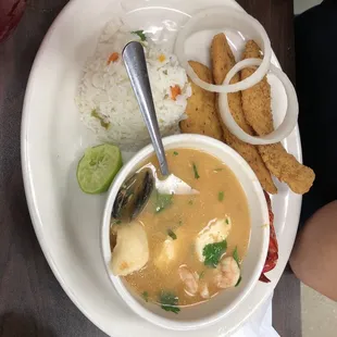 a bowl of soup with a spoon in it