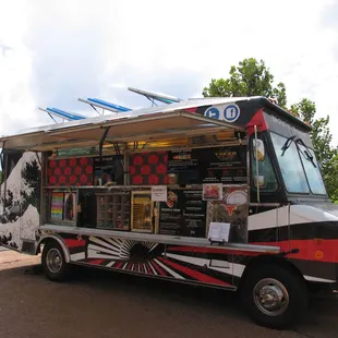 a food truck parked on the side of the road