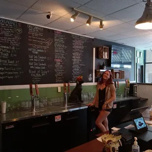a woman standing at the counter