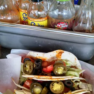 Soft tacos with sauce bucket, dairy free version. Wednesdays special 3 for 5.