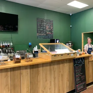 a woman behind the counter