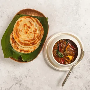 a plate of food and a bowl of soup