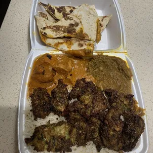 Take out box: pakoras, rice, naan, butter chicken, and mutter (pea) paneer