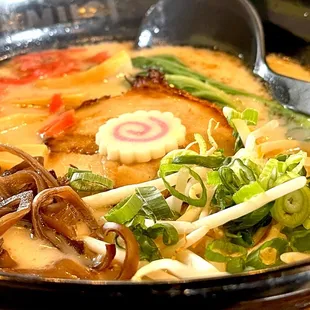 a bowl of ramen and chopsticks