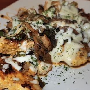 Smothered Chicken Dinner.  Chicken Breast, Cheese, And Mushrooms. Comes With Two Sides.