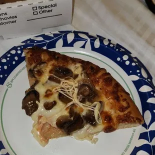 Well Done, Small Mushroom Pizza.  Look At Those Cheese Strings!  I Always Sprinkle A Little Salt And Pepper On It For Extra Flavor.