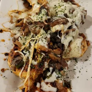 Smothered Chicken Dinner.  Comes With Two Sides.